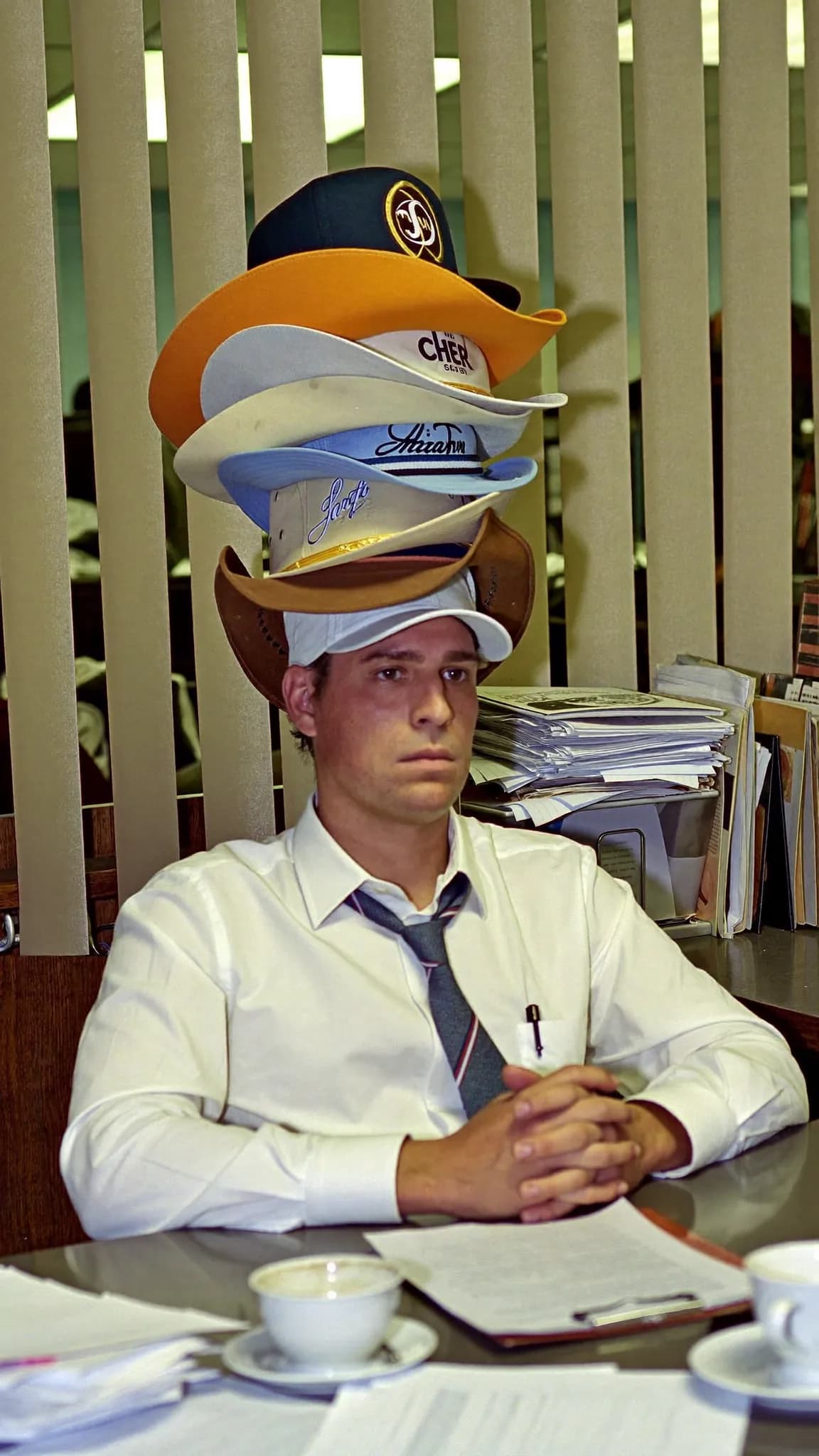 Stressed small business owner juggling tasks alone 7